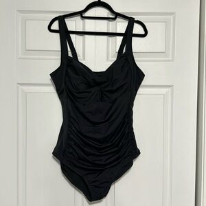 One piece tummy control swimsuit. Never worn